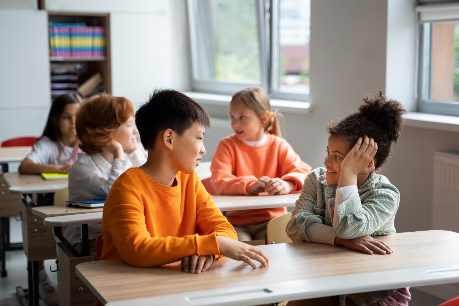 Diverse students in a bright classroom